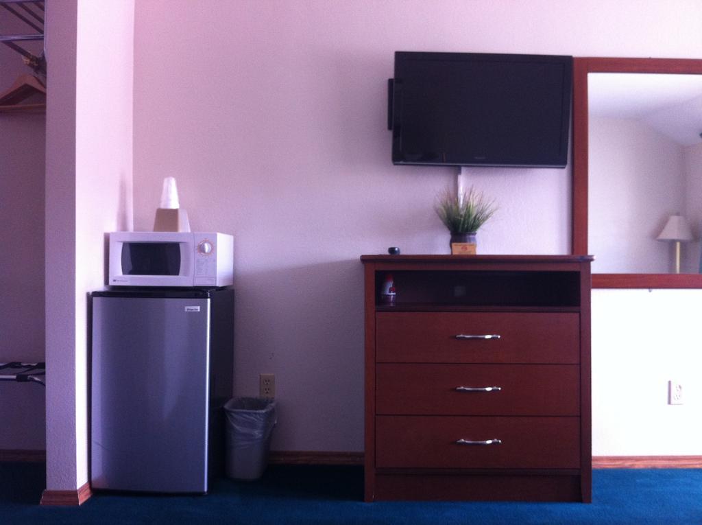 Legacy Inn Price Camera foto